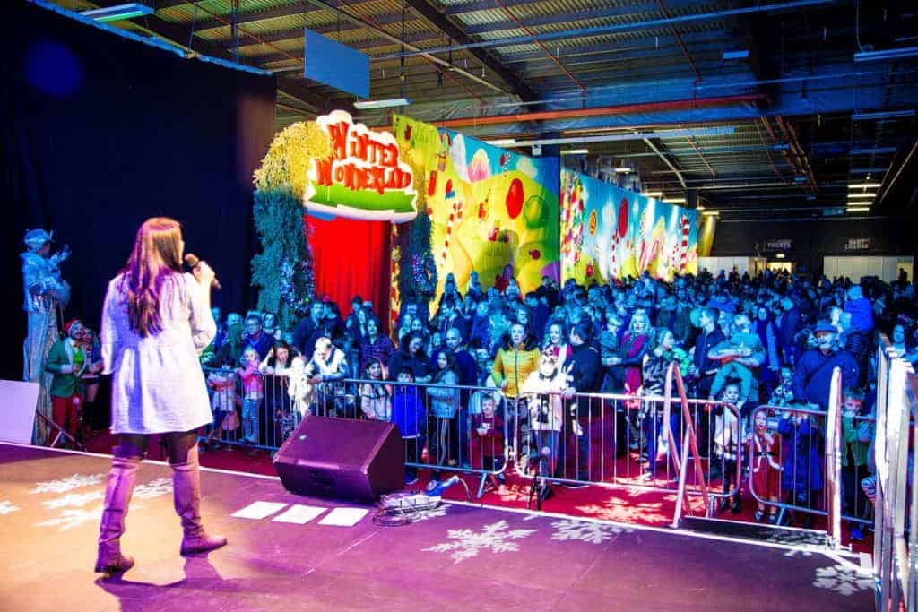 Entertainers keep visitors happy during the countdown to opening time at Winter Wonderland Manchester.