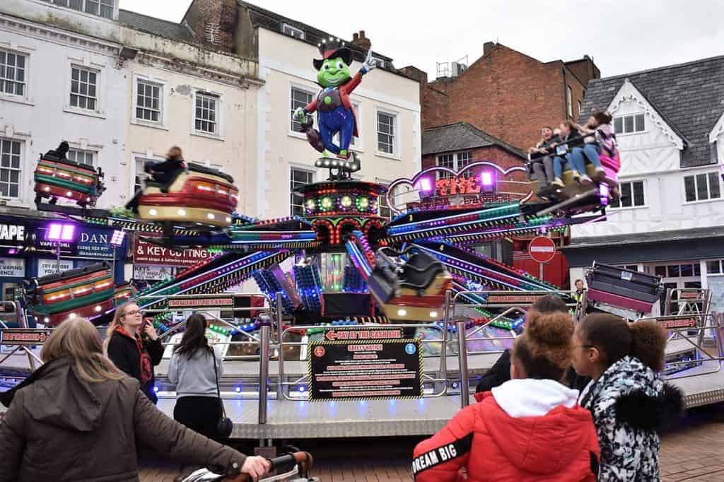 Photo of Andrew Holmes’ Can Can Jump & Smile in the Market Place.