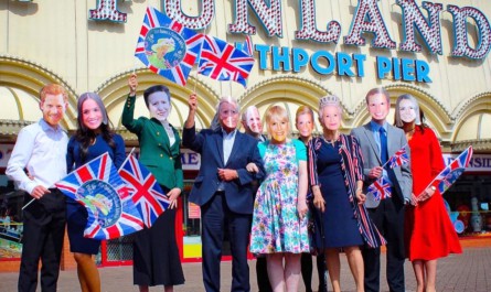 photo of people with Royal Family masks on