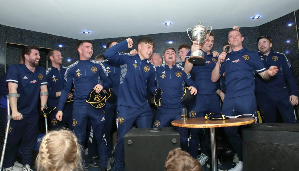 photo of Scotland team celebrating winning the cup