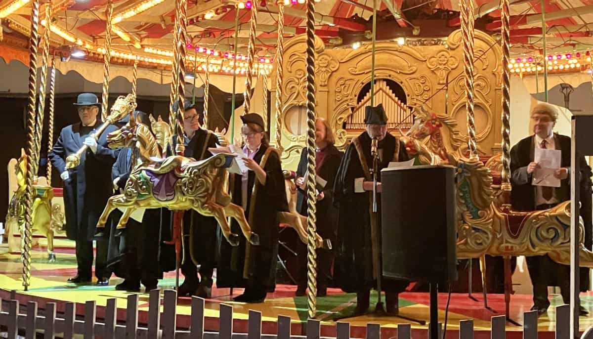 The civic party on Harry Hebborn’s Gallopers with Cllr Cheryl Briggs (last year’s Mayor) reading the Welcome at Abingdon Michaelmas Fair.