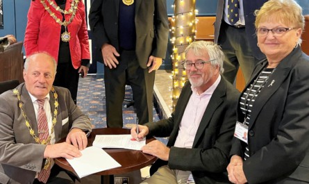 Western Section Chairman Tommy Charles and Sedgemoor DC Deputy Chief Executive Cllr Doug Bamsey sign the new ten-year agreement for Bridgwater, watched by Cllr Gill Slocombe, Deputy Leader of SDC. Tommy Charles also presented a cheque for charity to Cllr Slocombe.