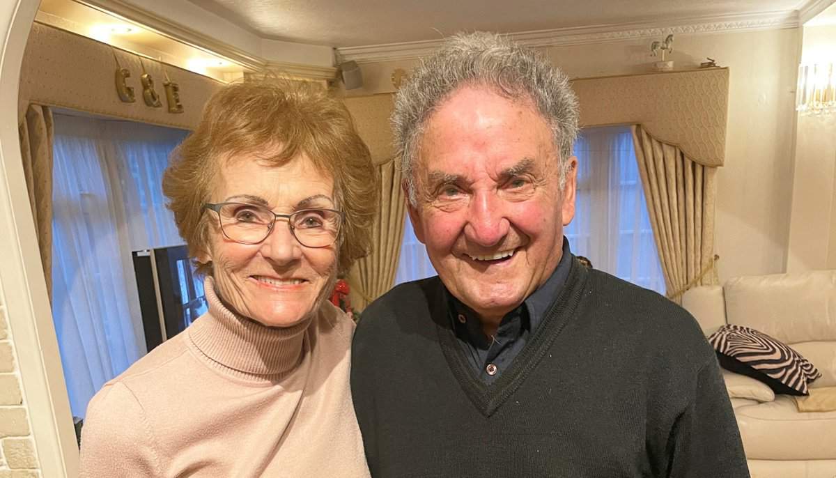 Gilbert and Eileen Chadwick pictured recently at home in Cheetham Hill, with a card sent to them last year by the Queen to mark their 62nd wedding anniversary.