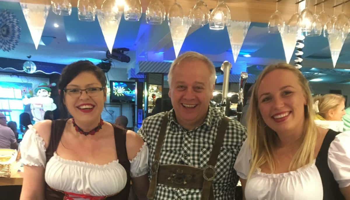 Dean Deakin with two of the bar staff at the Octoberfest event at Sunnyvale.
