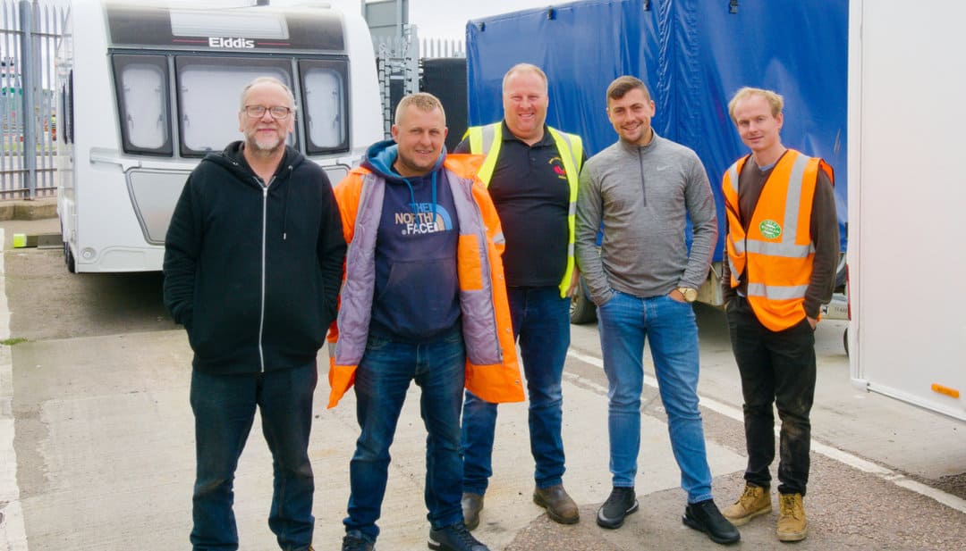 Joe Smith, Kenneth Stirling, Jensen Codona, Alex Hercher and Jordan Evans in the freight yard ready for the journey to Lerwick. Photo: John Marshall