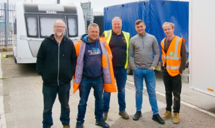 Joe Smith, Kenneth Stirling, Jensen Codona, Alex Hercher and Jordan Evans in the freight yard ready for the journey to Lerwick. Photo: John Marshall