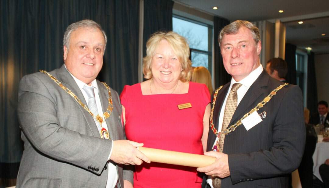 Keith James (right) and his wife Clarice being presented with Life Membership of the Guild by William Percival in 2013, during Keith’s tenure as Section Chairman.