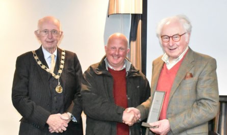 FAGB Chairman Graham Downie presents the Ronnie Taylor award to Anthony Harris Jnr for his contribution to the business and the presentation of his equipment, watched by Walsall Deputy Mayor Cllr Anthony Harris Snr.